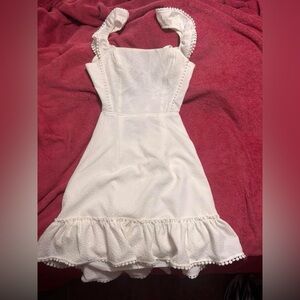 White Sleeveless Dress with Ruffle Hem